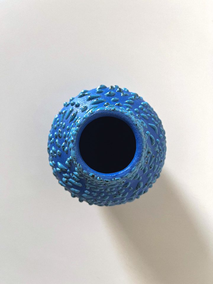 Deep blue handmade ceramic vase with textured droplets around the neck, second view